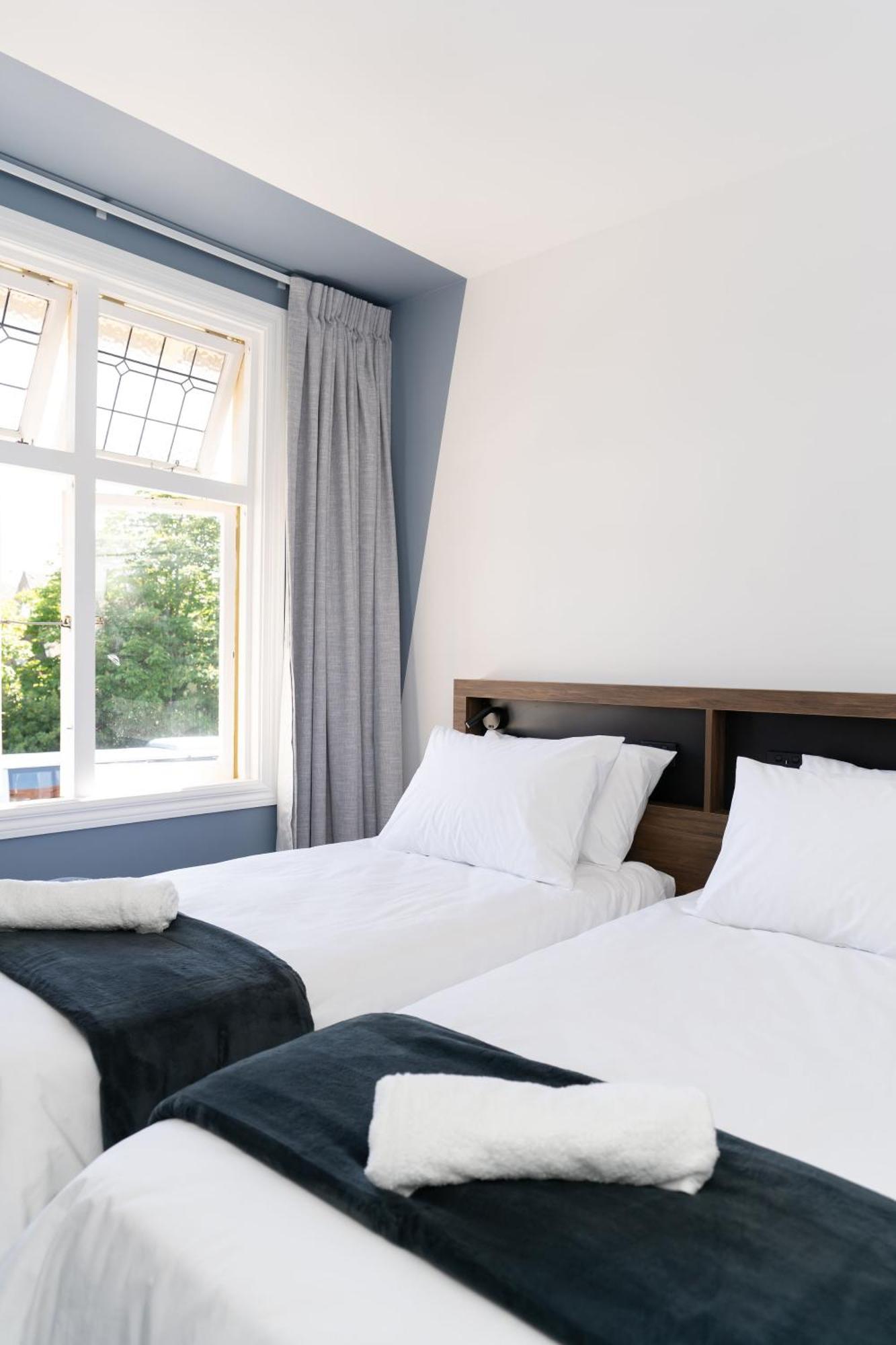 Haka House Christchurch Exteriér fotografie A bedroom at the hotel