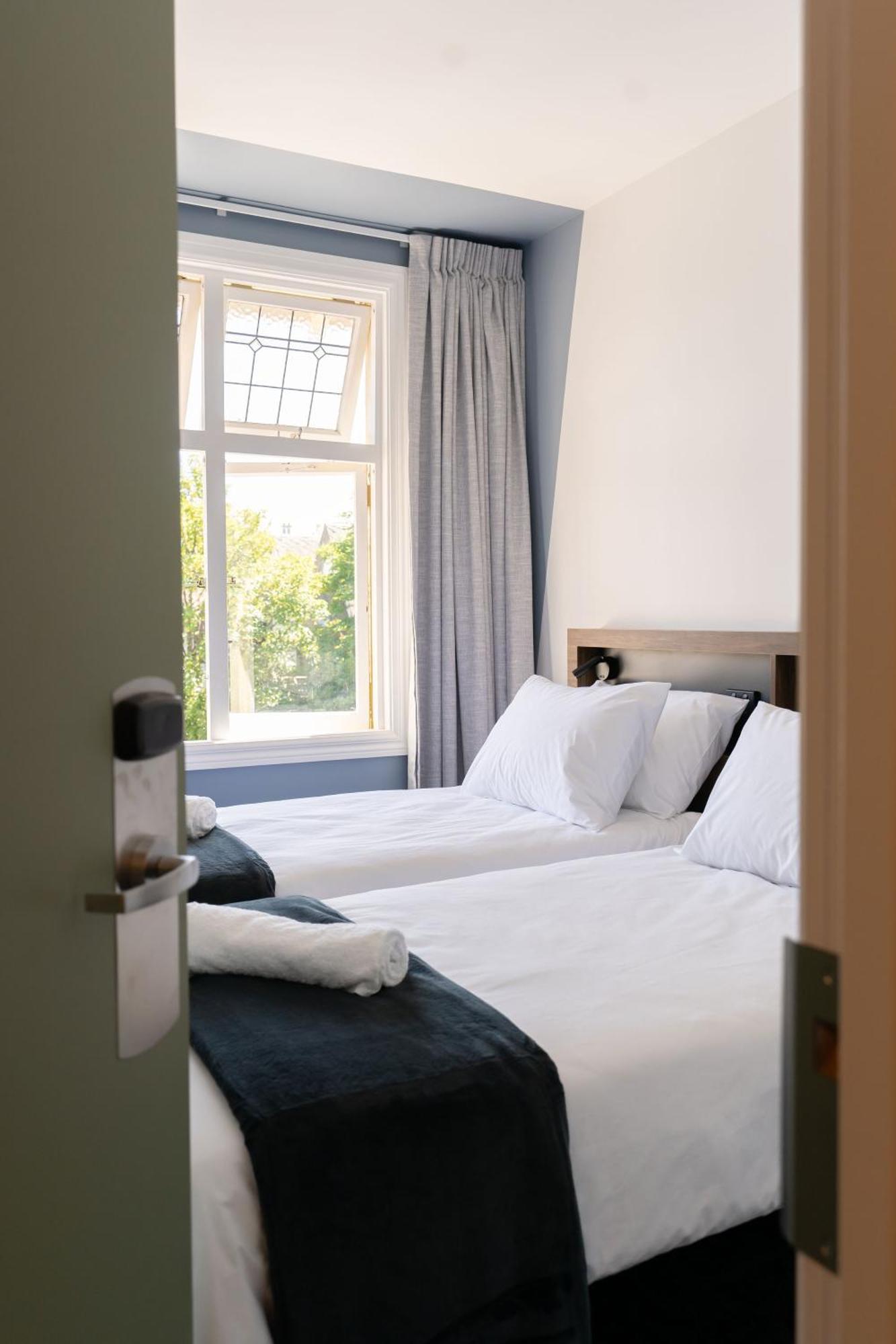 Haka House Christchurch Exteriér fotografie A room at the hotel